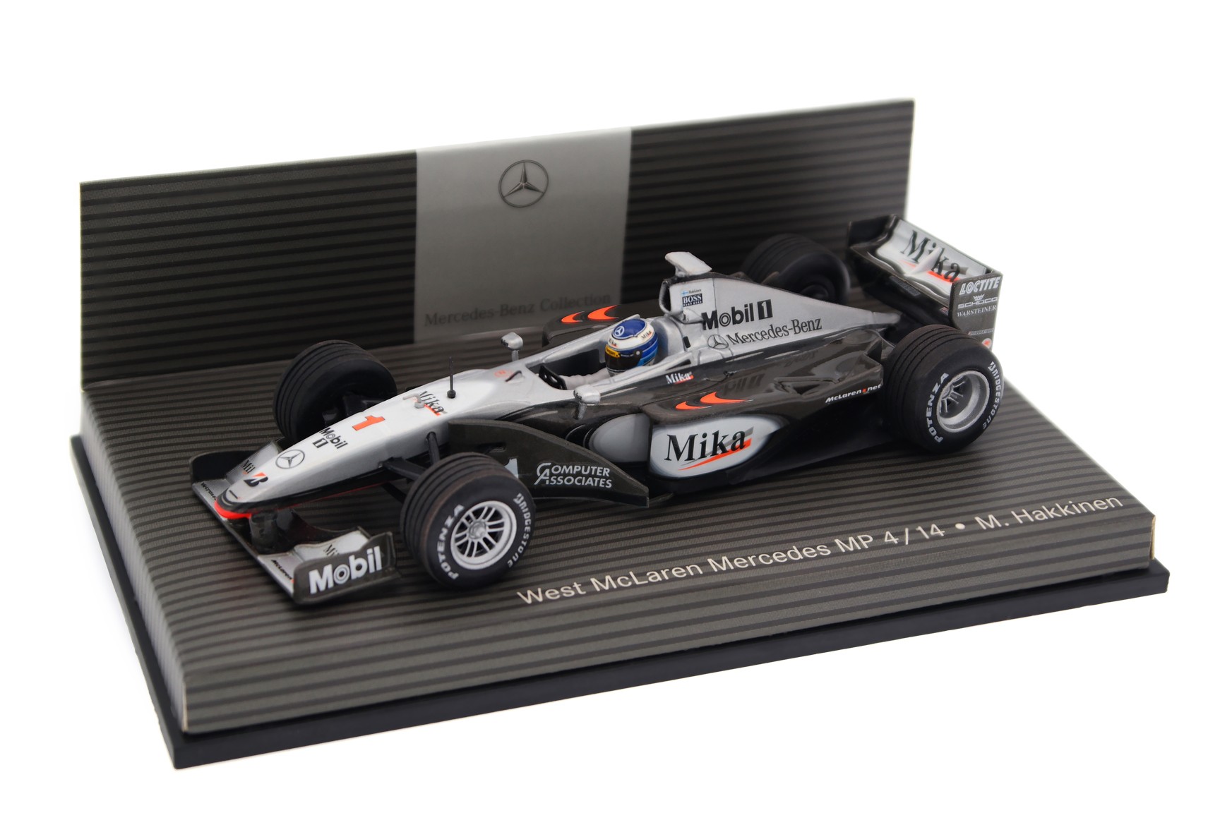A collectible scale model 1/43 McLaren MP4/14 from Minichamps F1