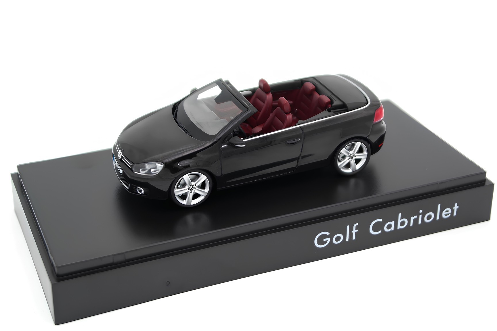 A collectible scale model VW Golf Cabriolet from Schuco