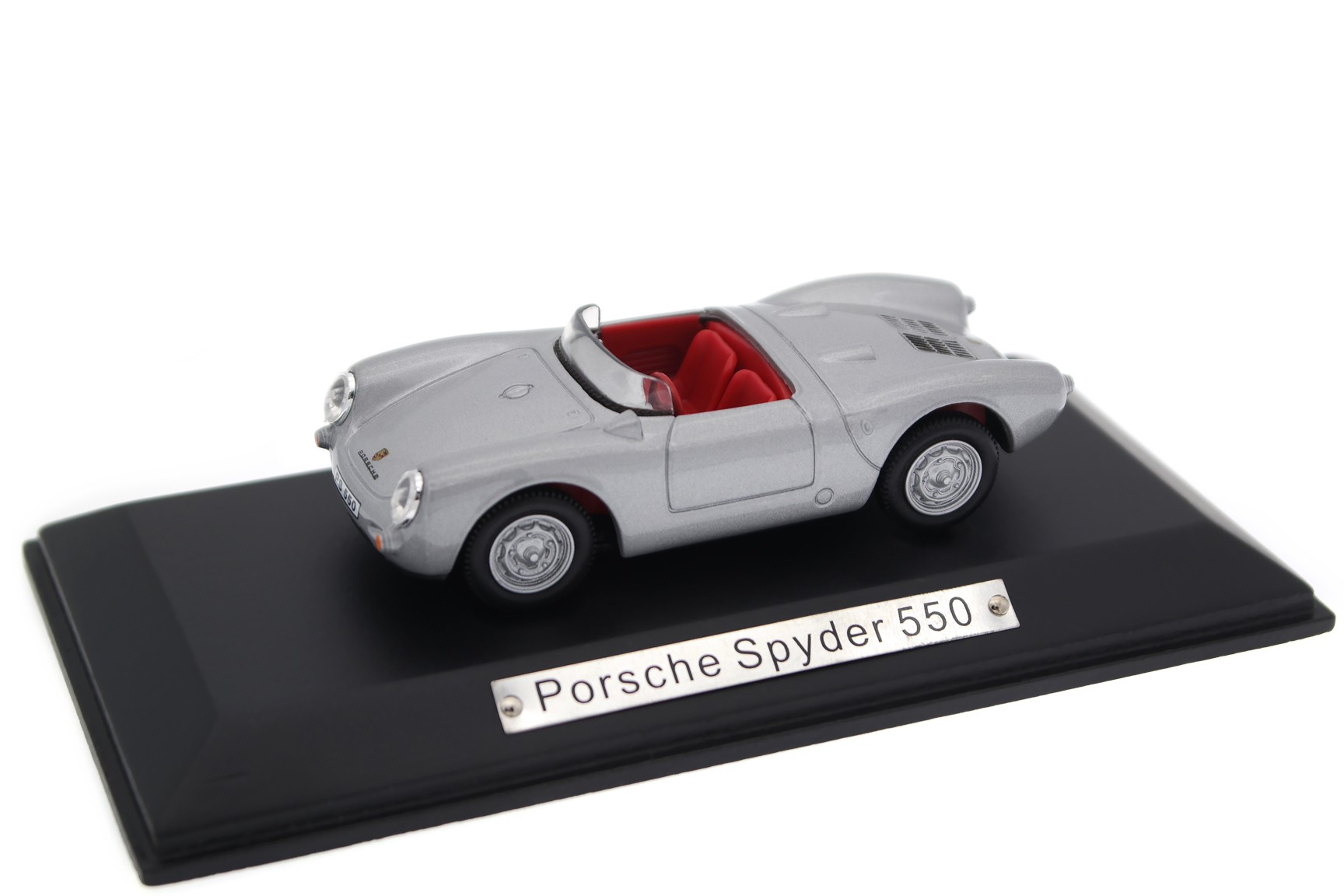 A collectible scale model Porsche Spyder 550 from Cararama