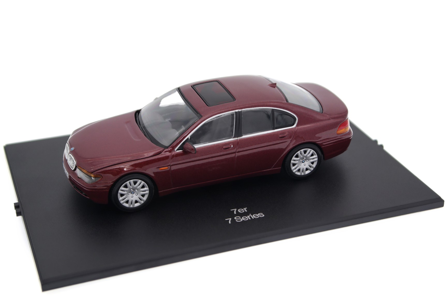 A collectible scale model BMW 7 Series from Minichamps