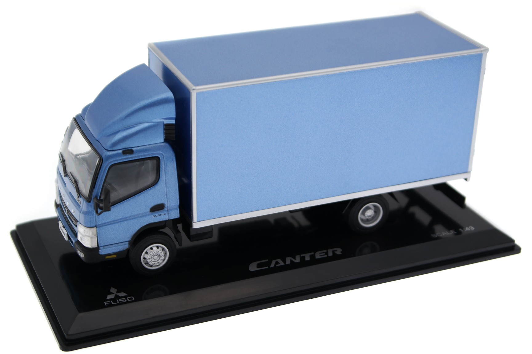 A collectible scale model Mitsubishi Fuso Canter from IXO