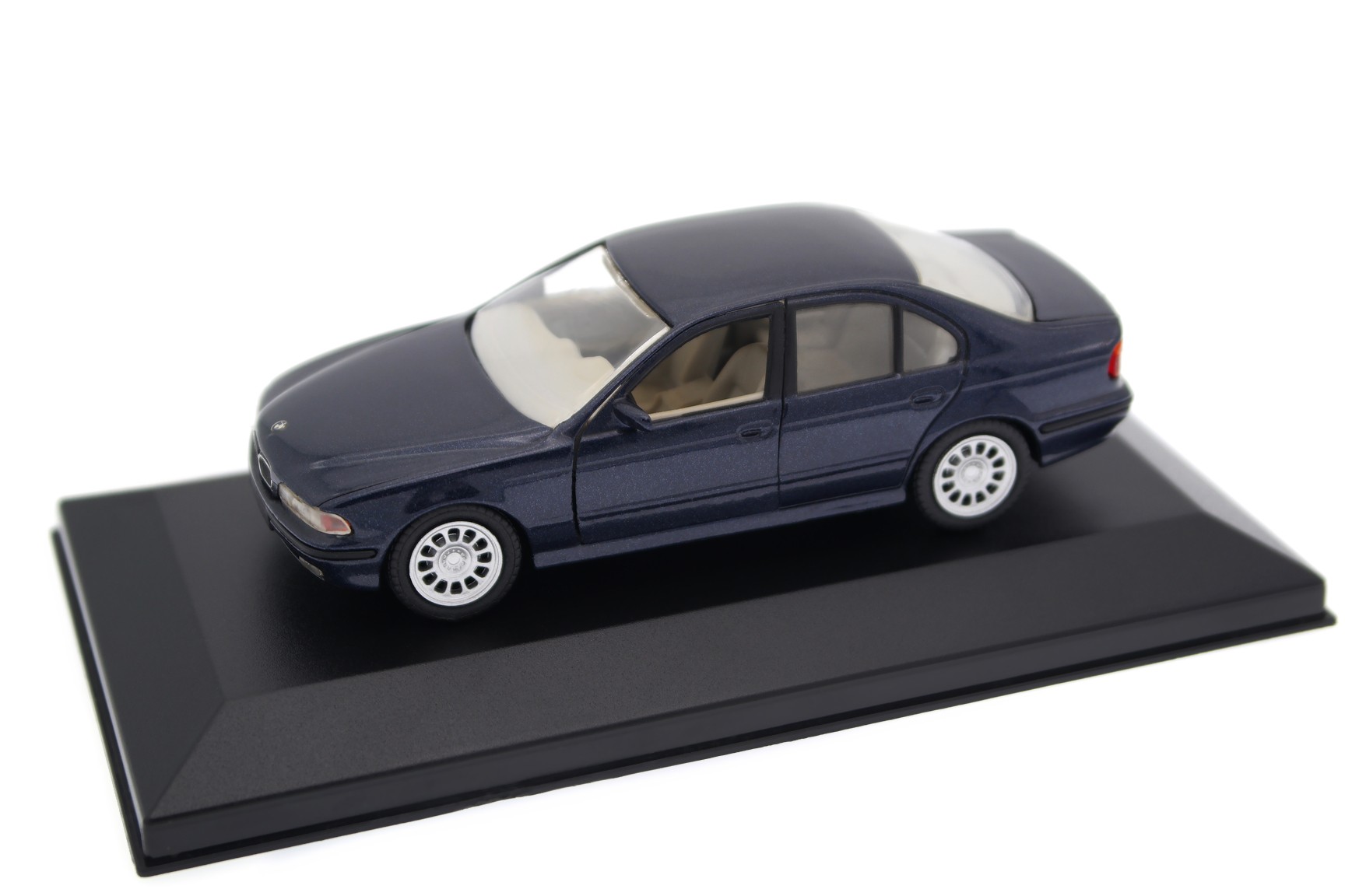 A collectible scale model BMW 5 Series from Schabak