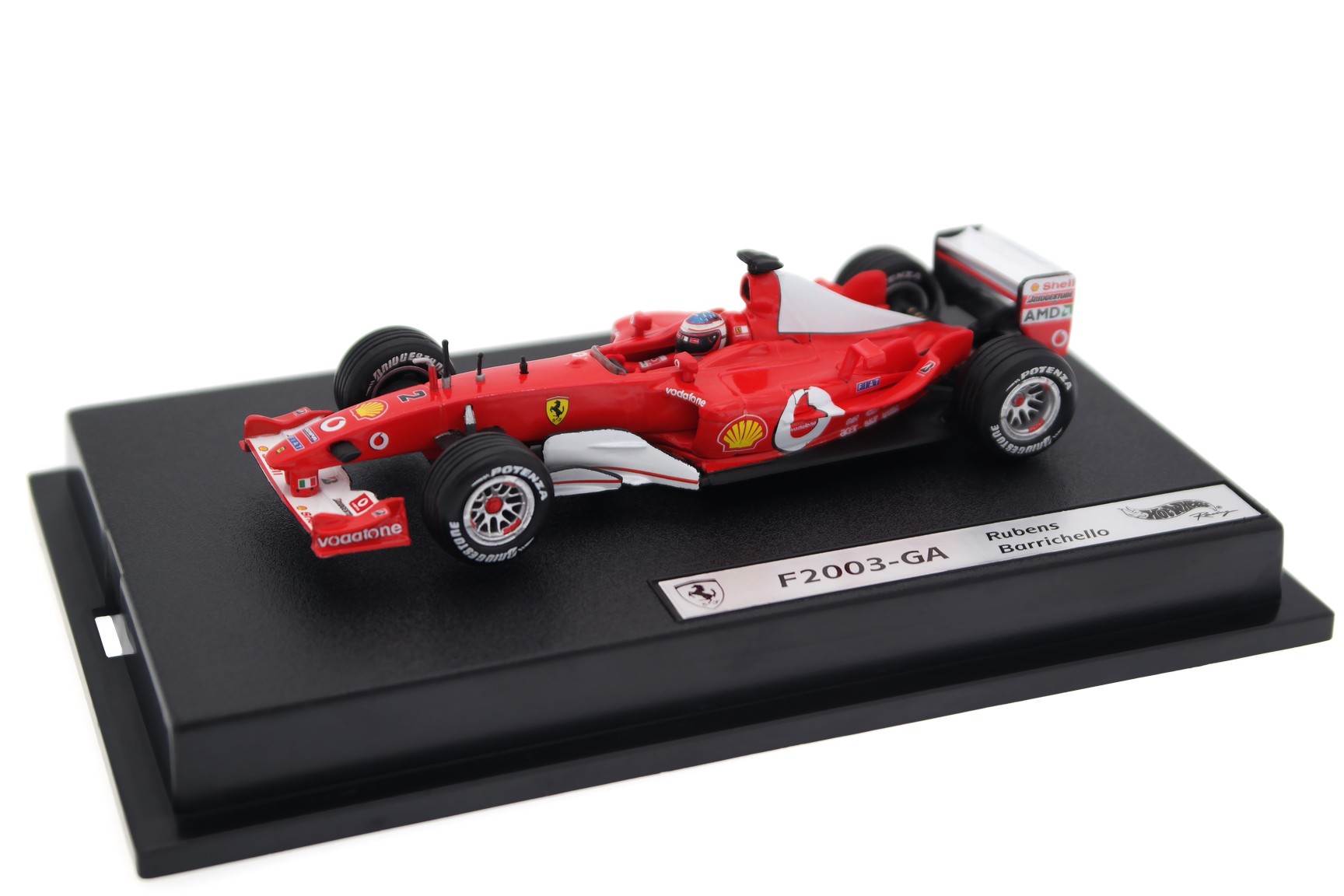 A collectible scale model Ferrari F2003-GA from Hot Wheels