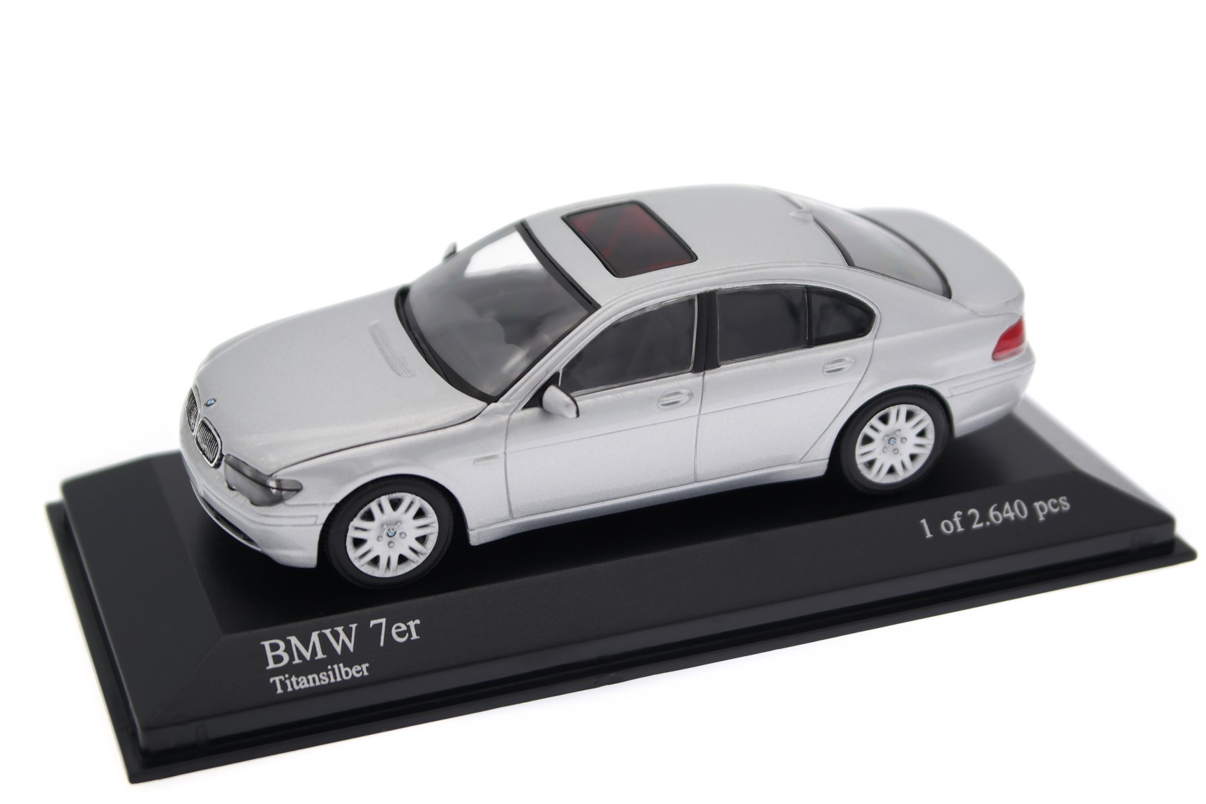 A collectible scale model BMW 7 Series from Minichamps