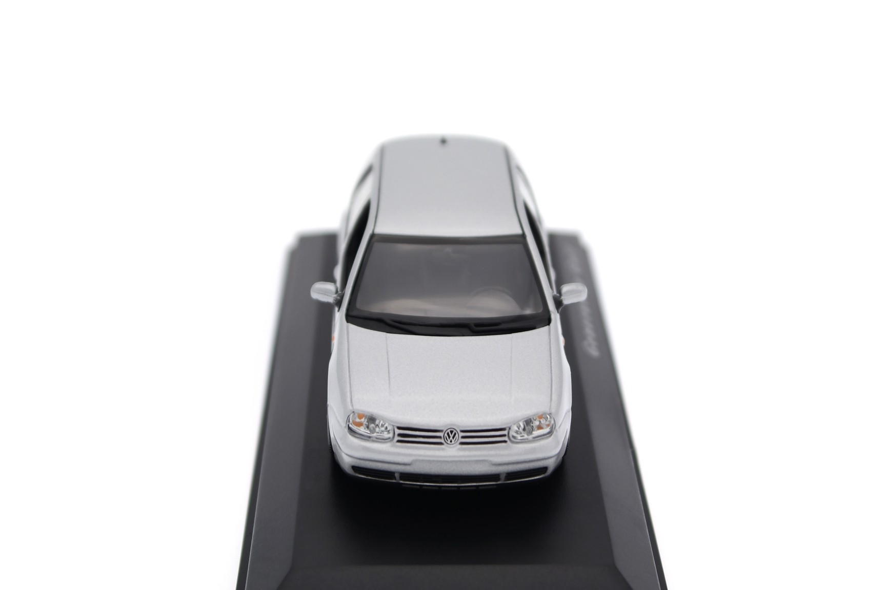 A collectible scale model VW Golf GTI from Minichamps