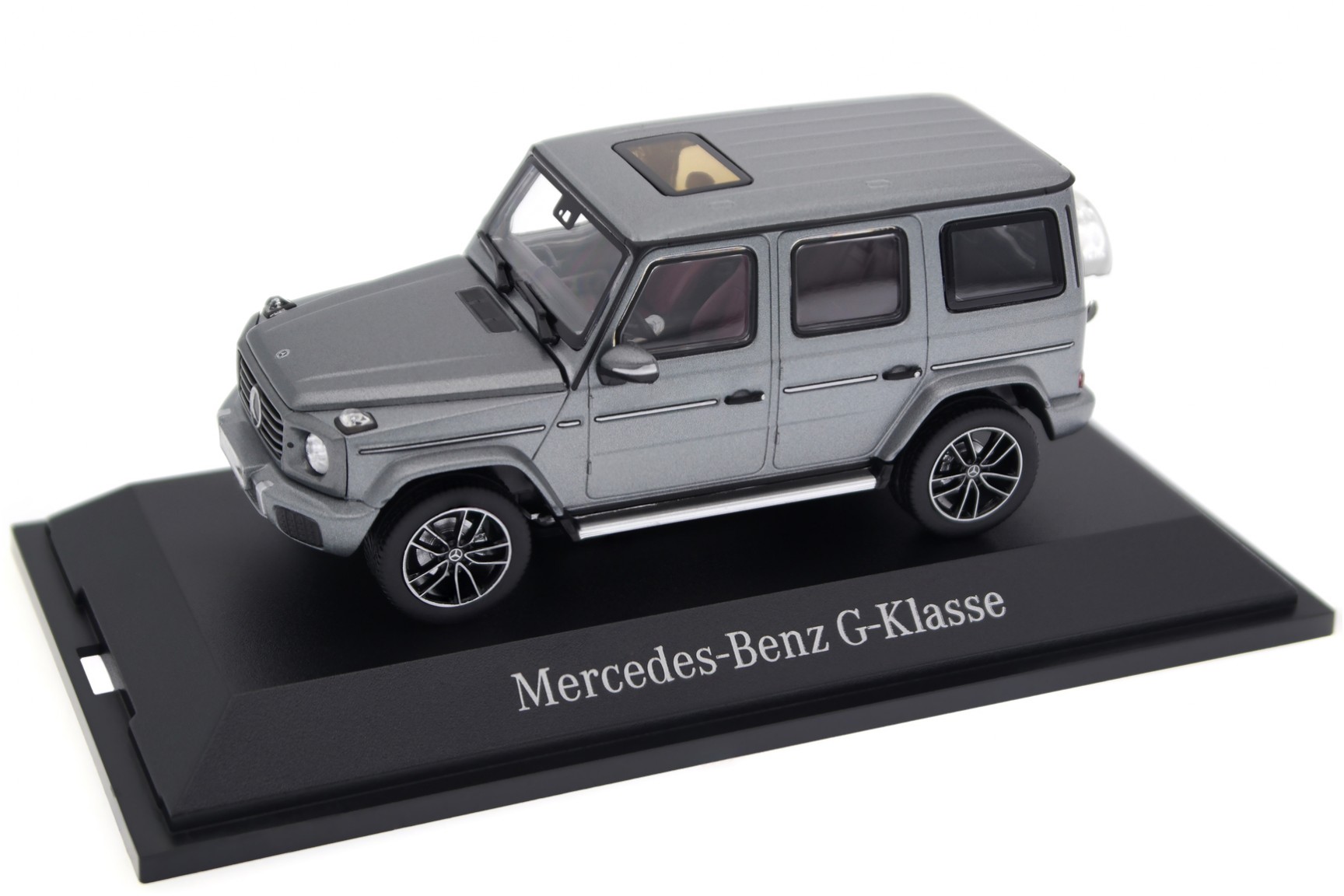 A collectible scale model Mercedes-Benz G-Class from Norev