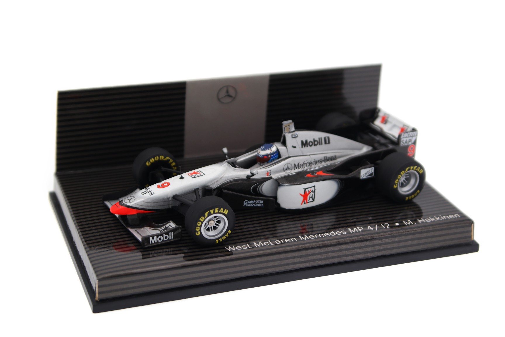 A collectible scale model McLaren MP4/12 from Minichamps F1