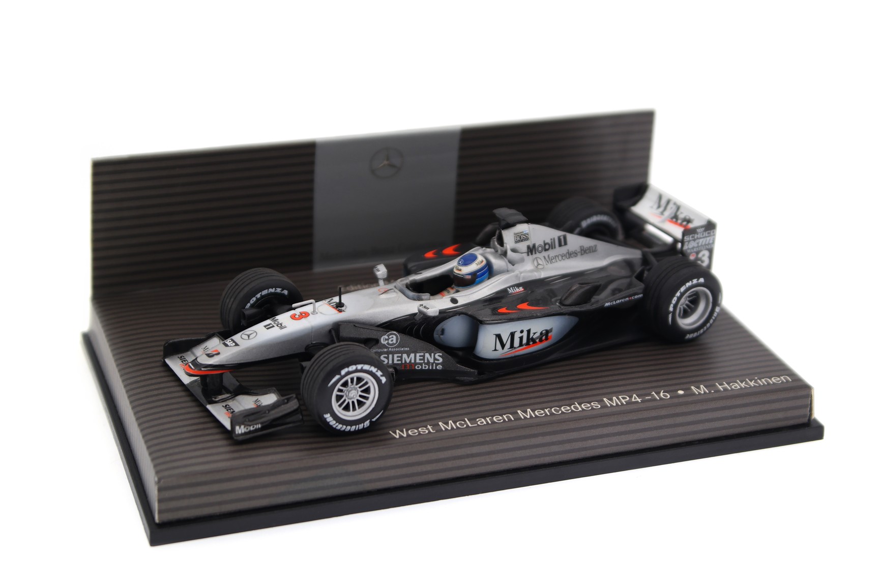 West McLaren Mercedes ミニカー シルバー A collectible scale model McLaren MP4/16 from Minichamps F1