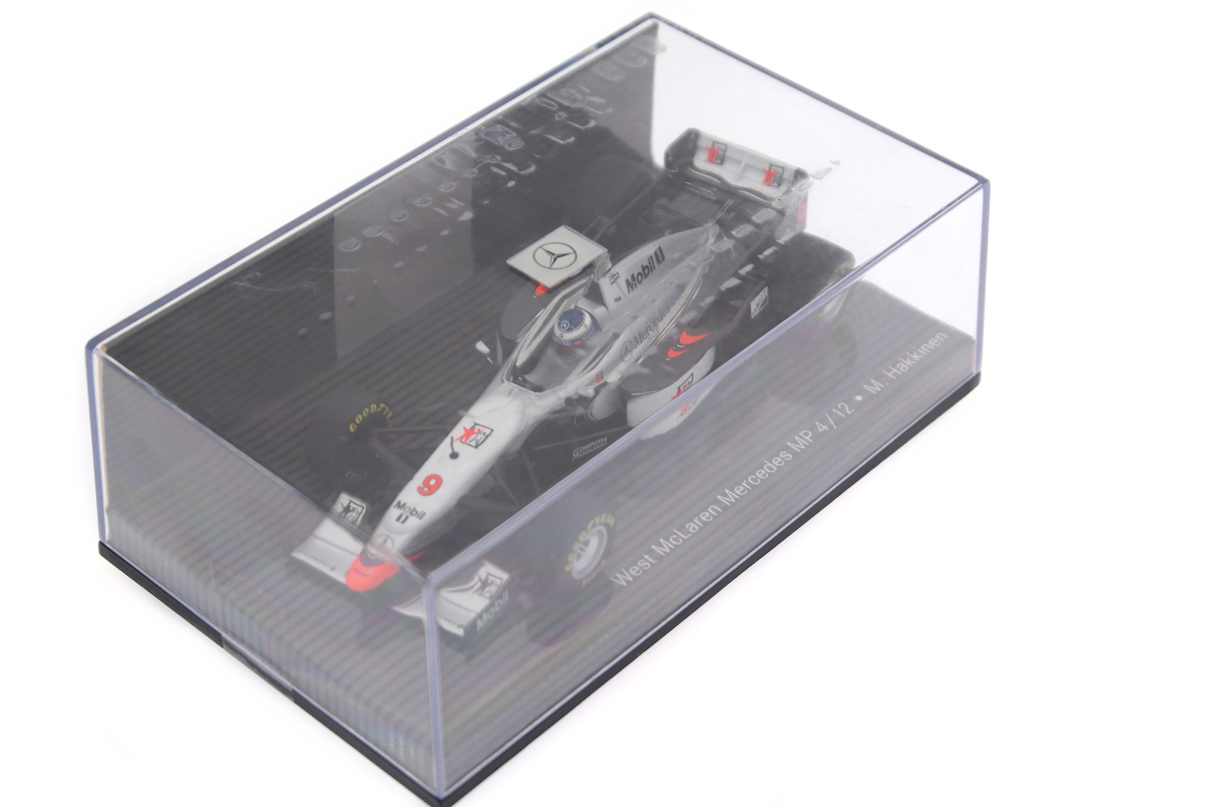 A collectible scale model McLaren MP4/12 from Minichamps F1