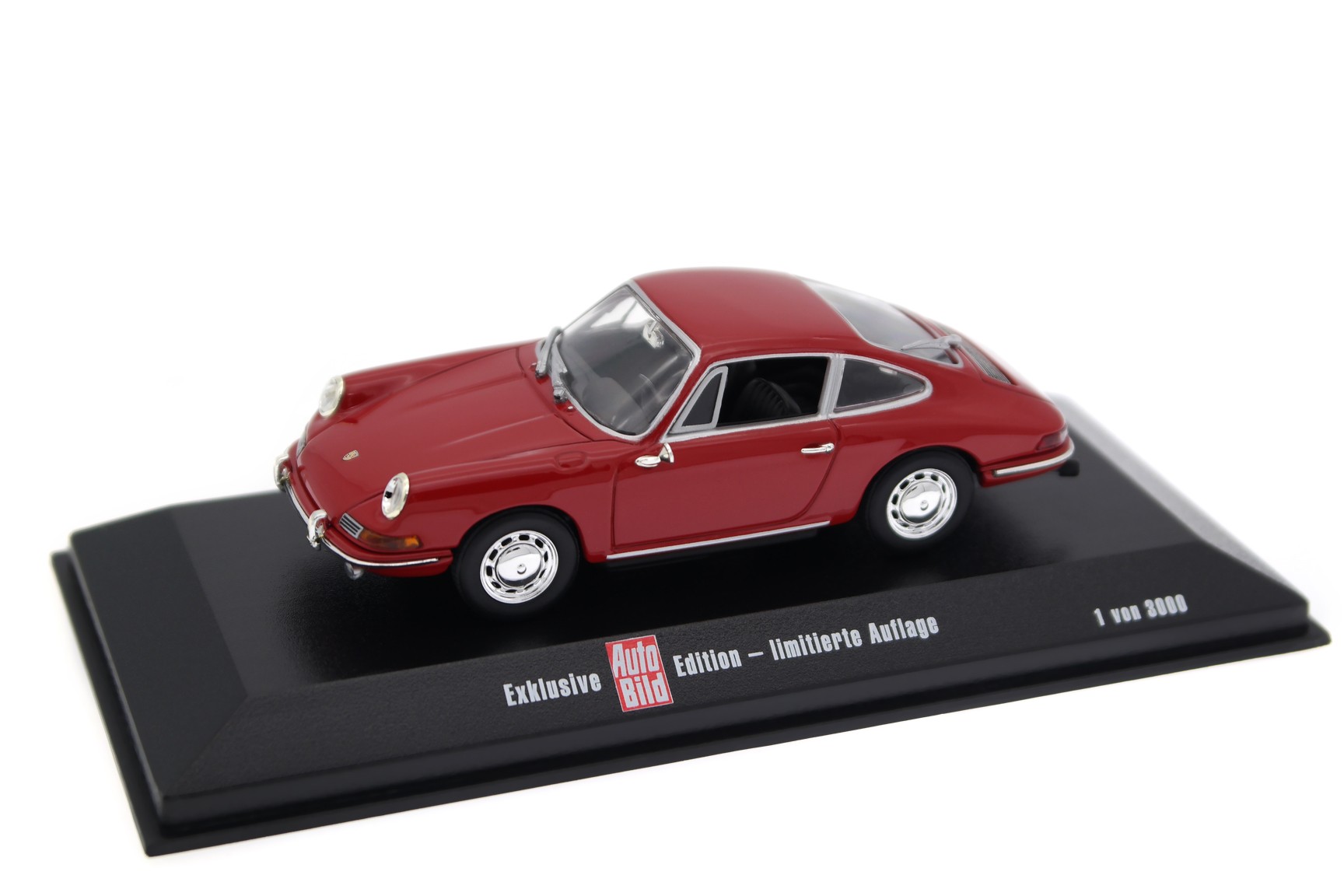 A collectible scale model Porsche 911 from Minichamps