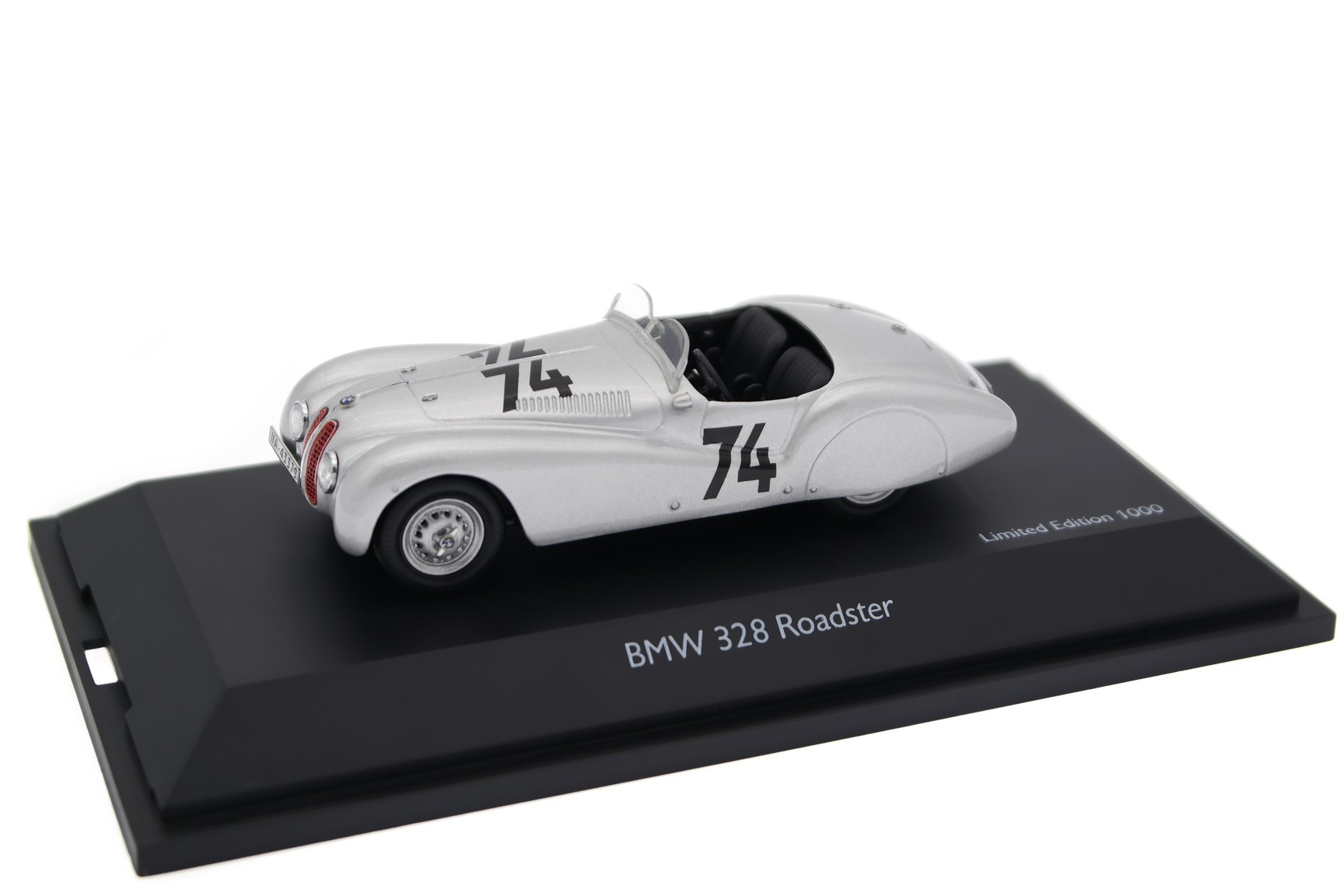 A collectible scale model BMW 328 Mille Miglia from Schuco