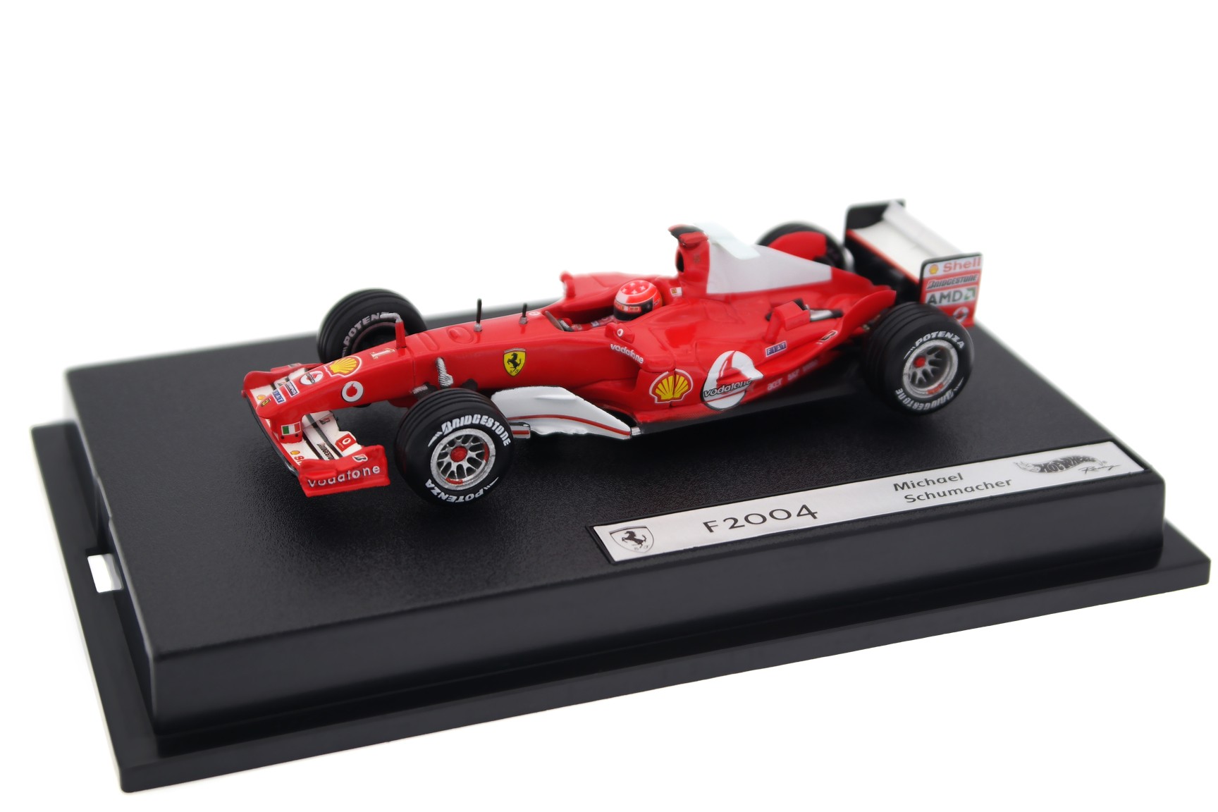 A collectible scale model Ferrari F2004 from Hot Wheels