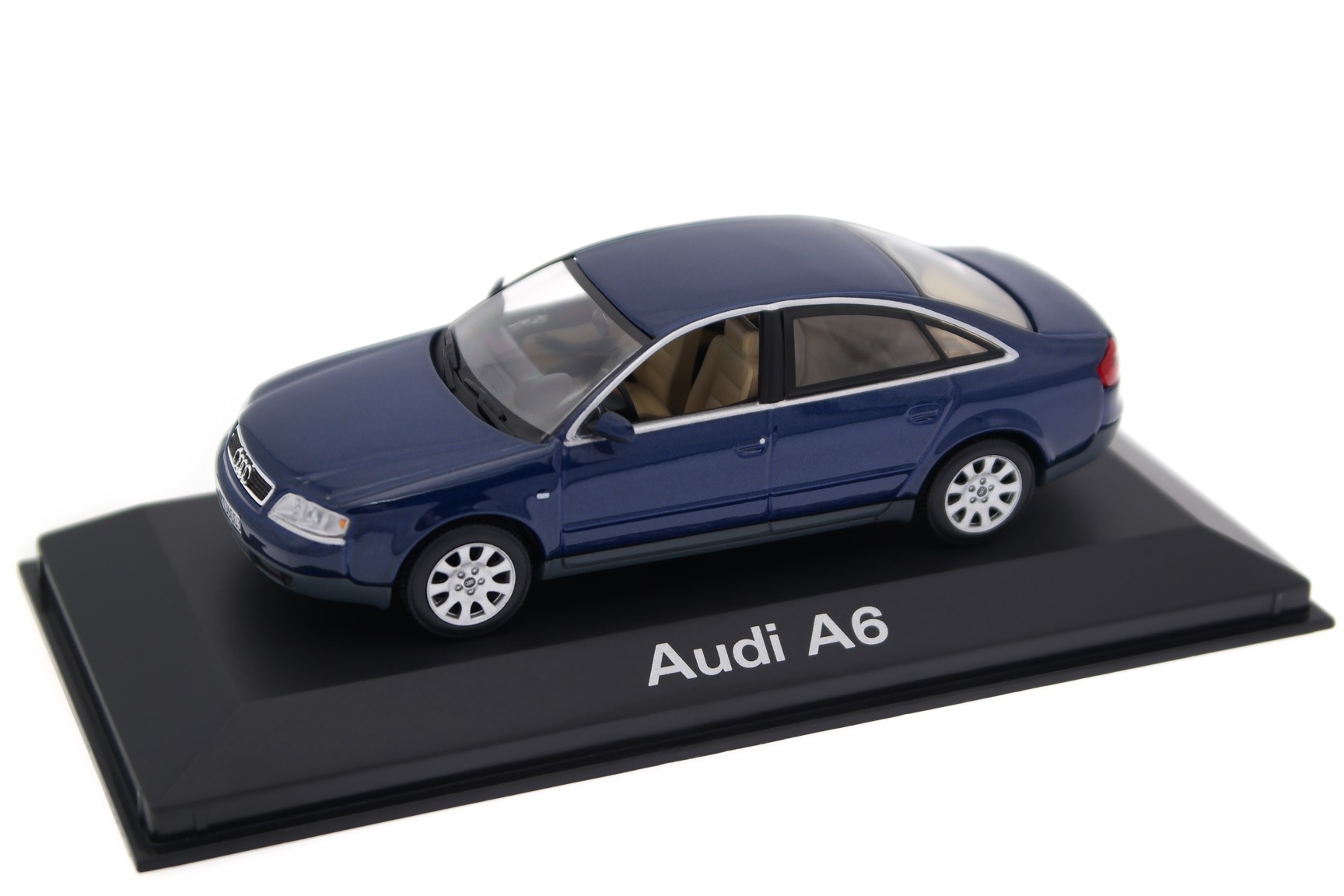 A collectible scale model Audi A6 from Minichamps