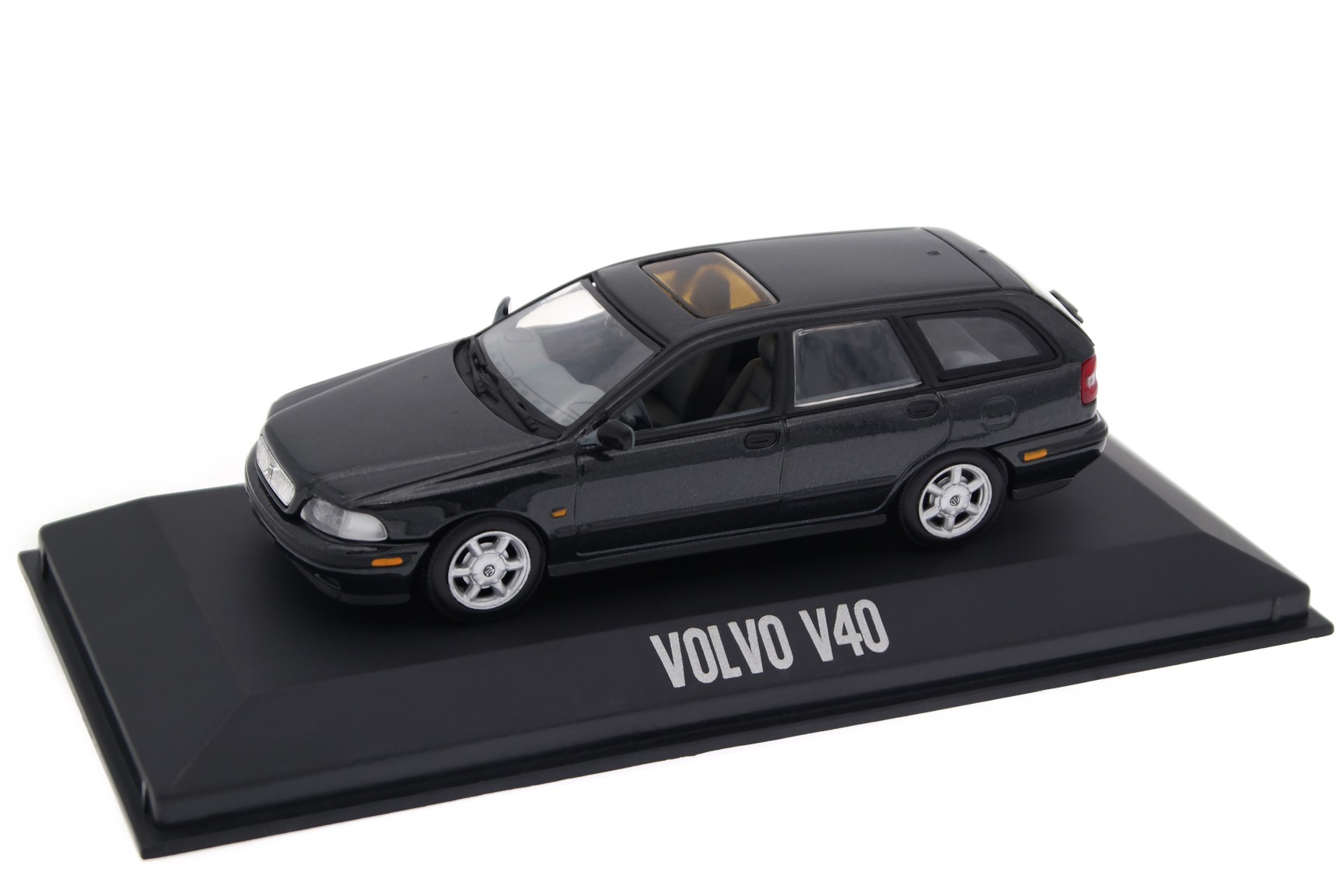 A collectible scale model Volvo V40 from Minichamps
