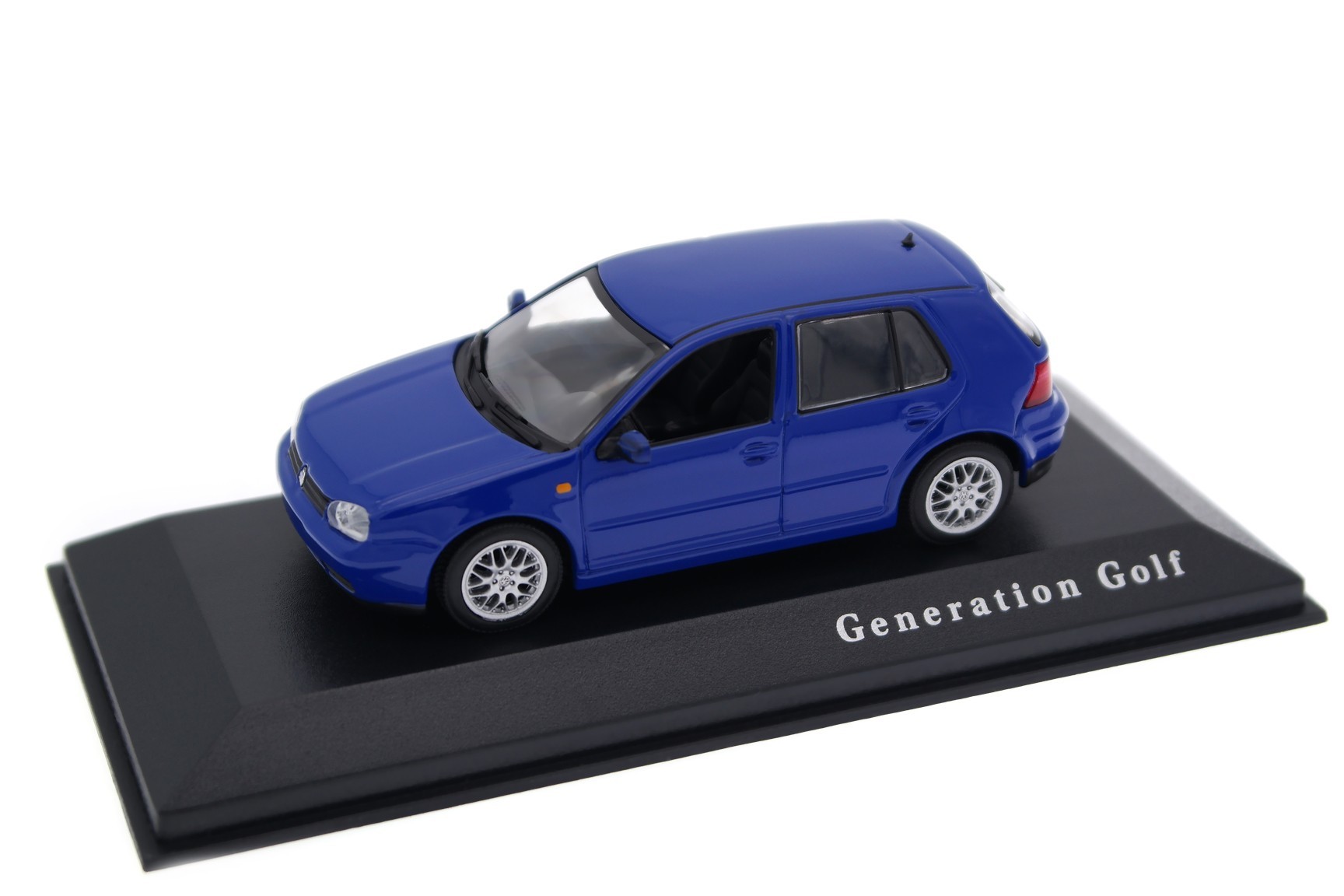 A collectible scale model VW Golf GTI from Minichamps