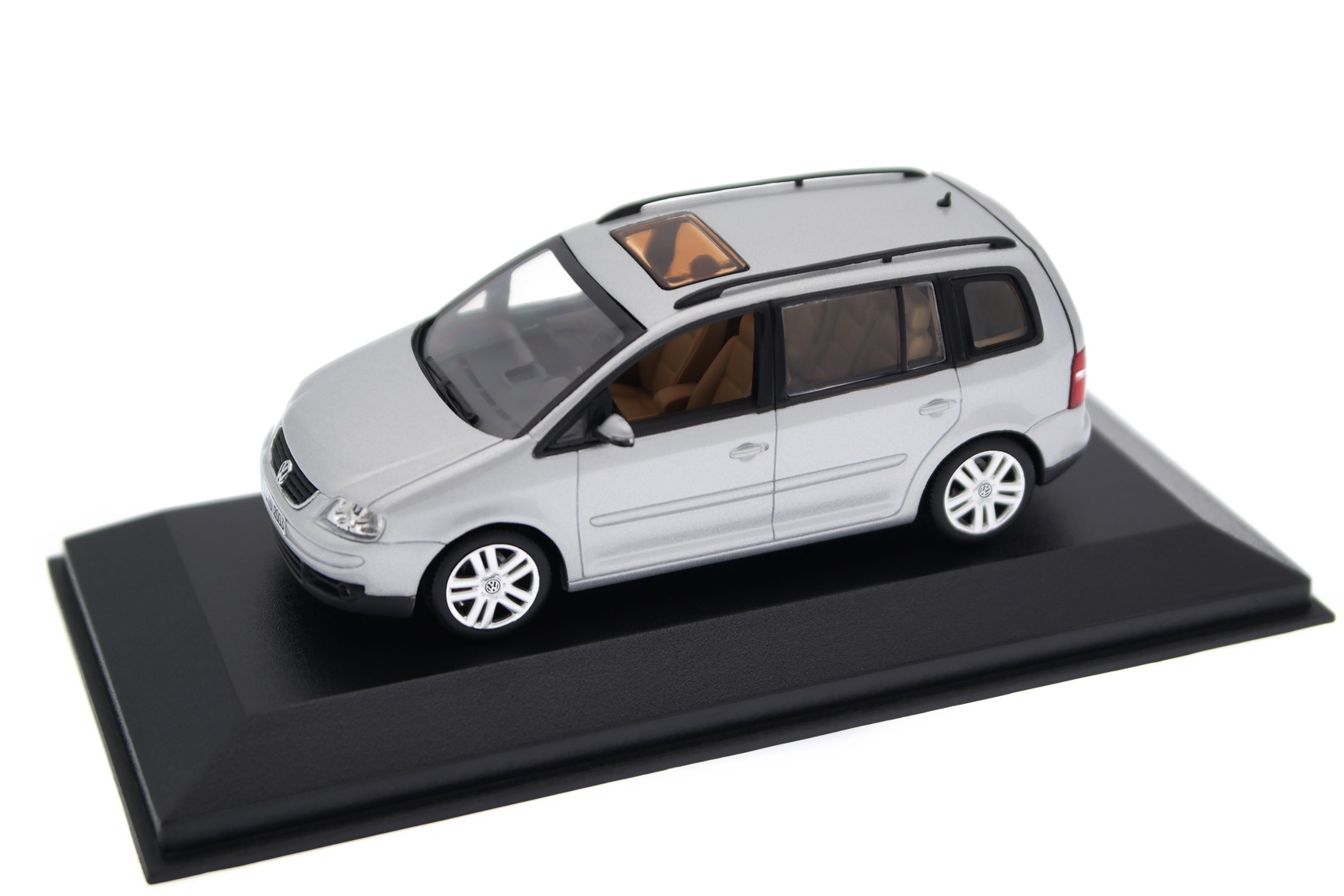 A collectible scale model VW Touran from Minichamps
